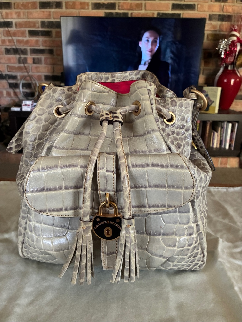 Dooney & Bourke Cream Croc-Embossed Drawstring Bucket Bag with Tassels